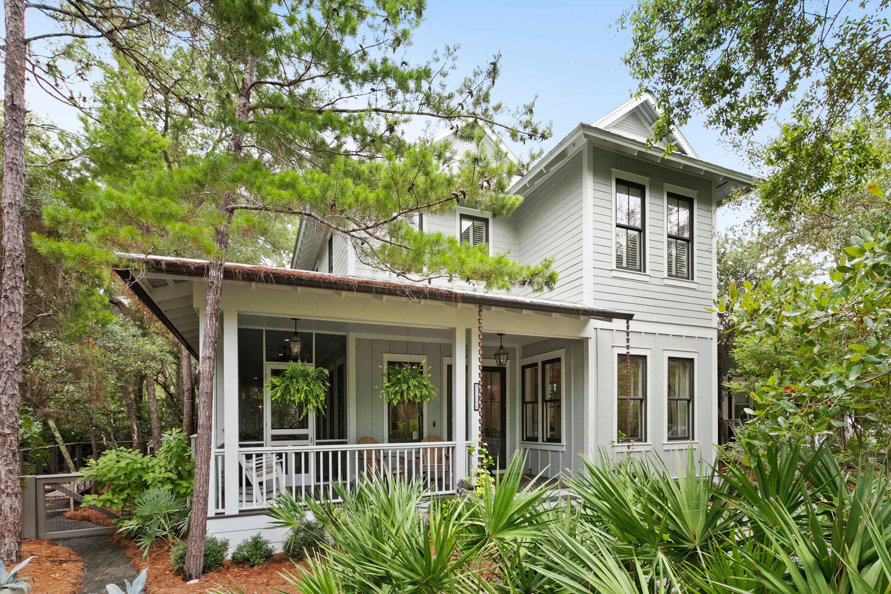 120 Hammock Lane Santa Rosa Beach, FL 32459 - Photo 7 of 57 a view of a house with a flower garden