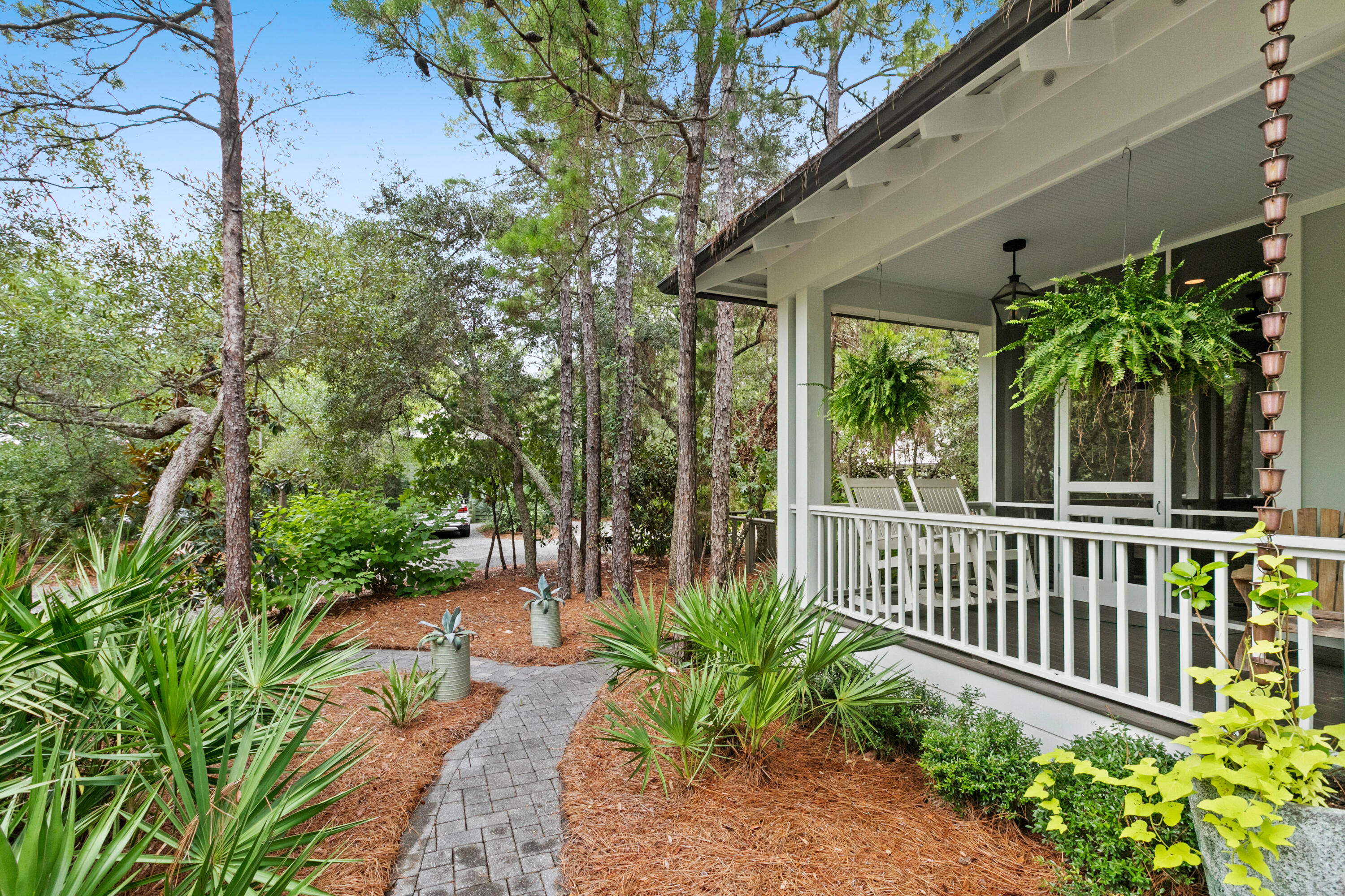 120 Hammock Lane Santa Rosa Beach, FL 32459 - Photo 8 of 57 a view of a garden with a deck