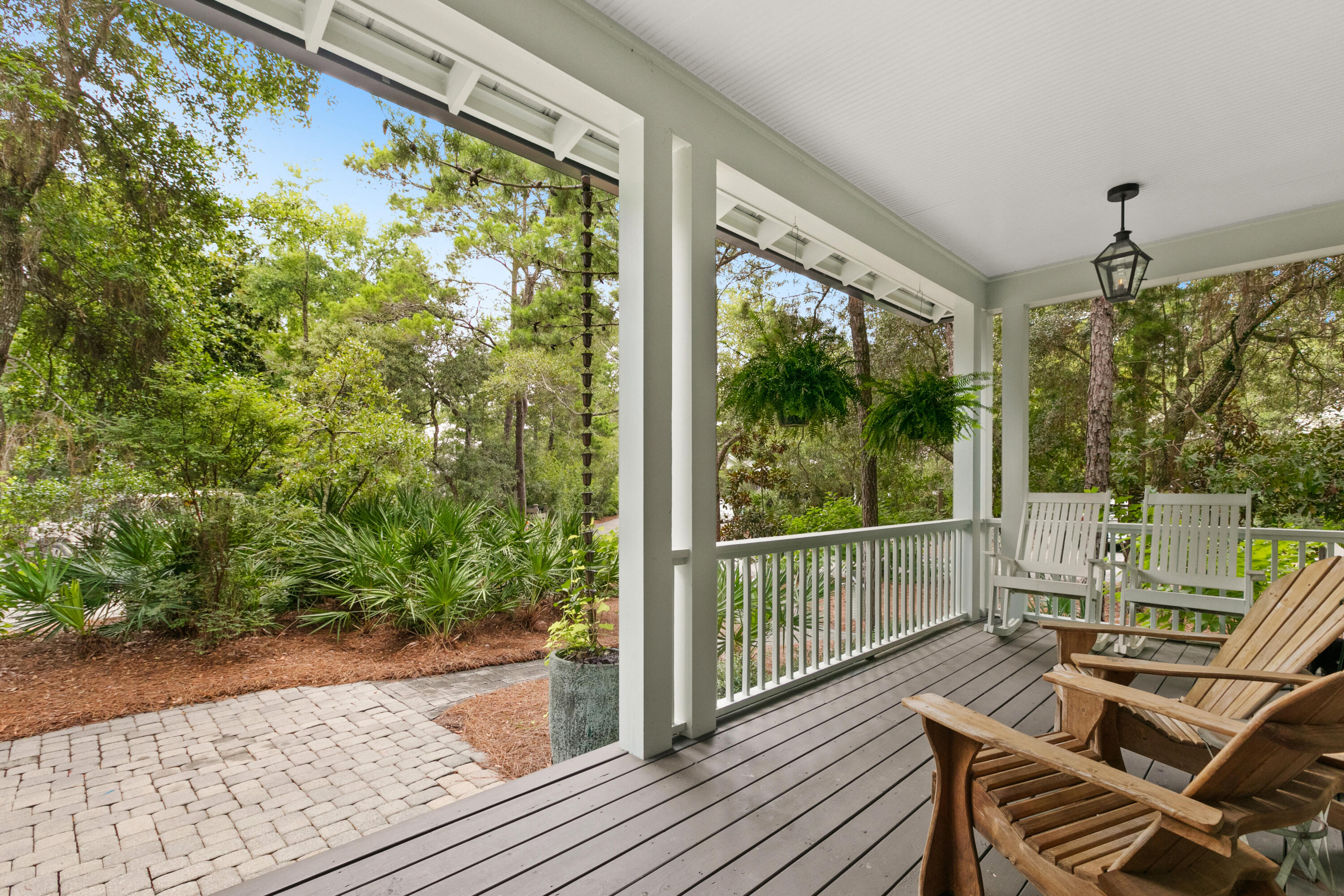 120 Hammock Lane Santa Rosa Beach, FL 32459 - Photo 10 of 57 a view of a balcony with chair and wooden floor