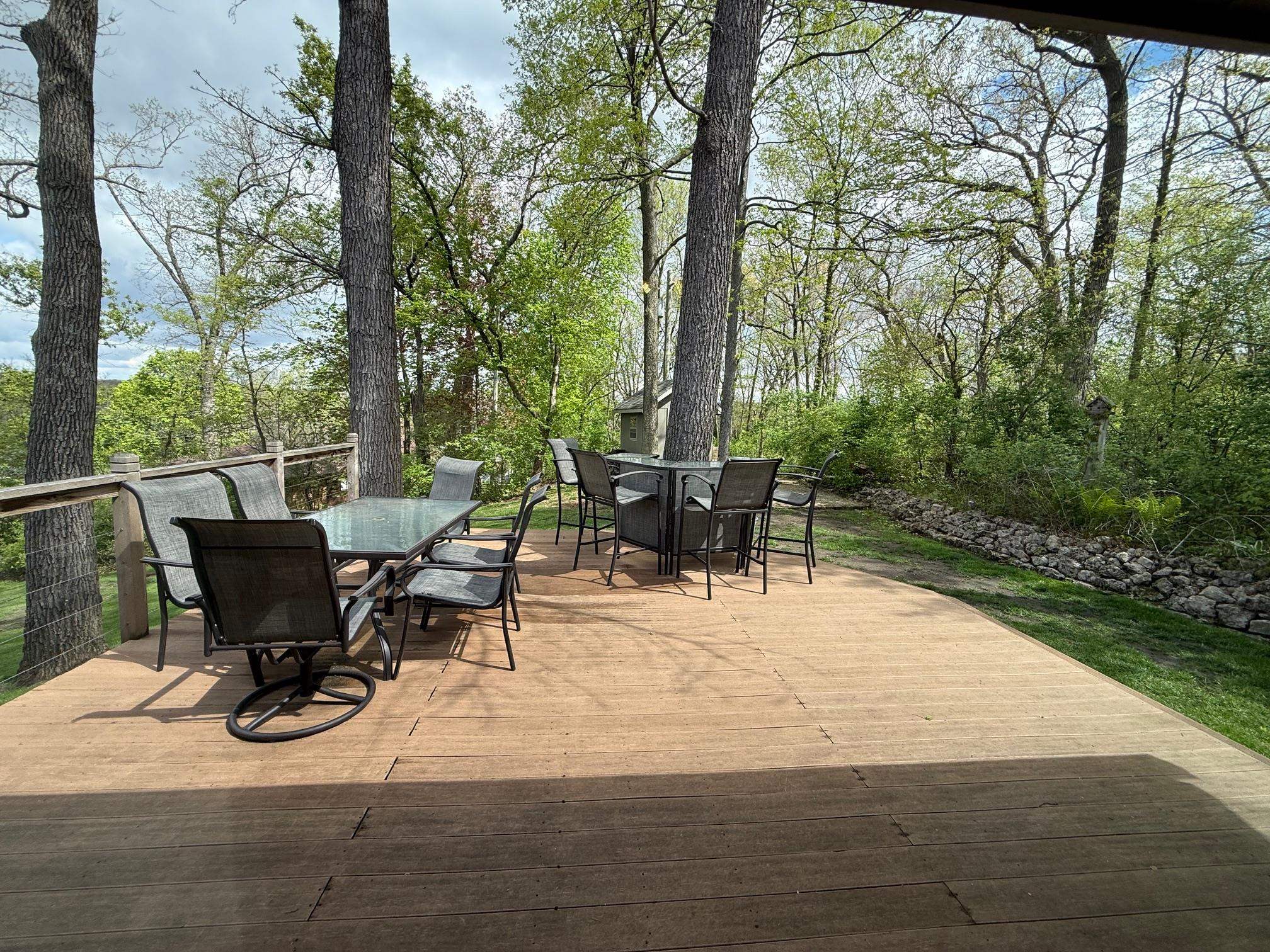 7758 Ray Court Roscoe, IL 61073 - Photo 11 of 37 a view of a patio with table and chairs and potted plants