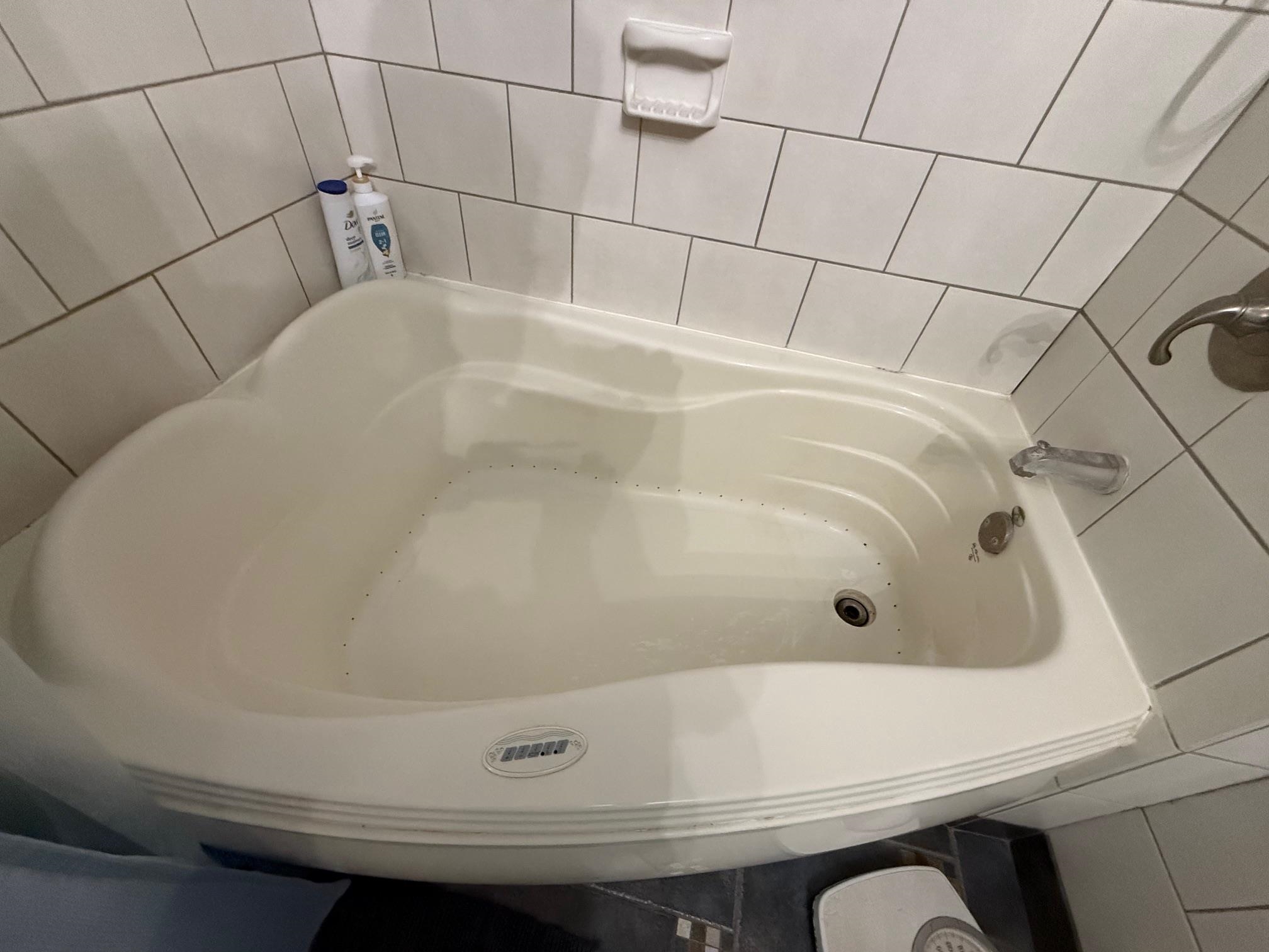 7758 Ray Court Roscoe, IL 61073 - Photo 18 of 37 a bathroom with a bathtub