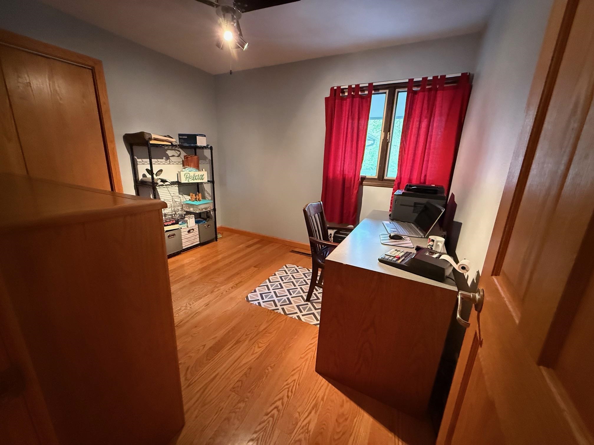 7758 Ray Court Roscoe, IL 61073 - Photo 20 of 37 a view of a living room with furniture and a flat screen tv