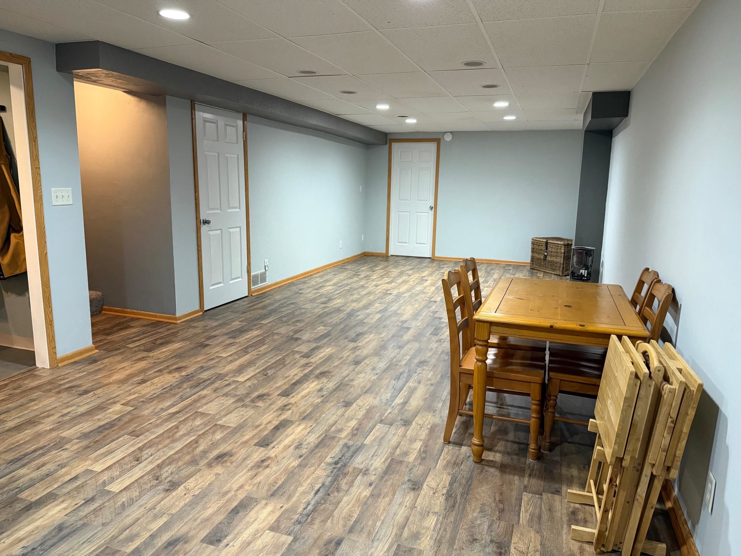 7758 Ray Court Roscoe, IL 61073 - Photo 25 of 37 a view of a dining room with furniture and wooden floor
