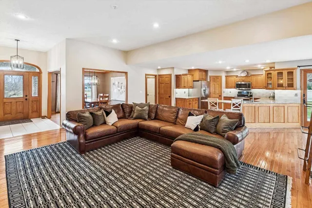 a living room with furniture and a table