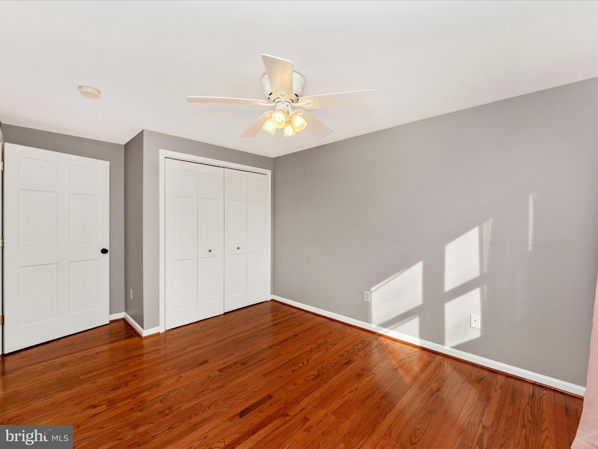 5610 Braxfield Road Halethorpe, MD 21227 - Photo 18 of 32 a view of empty room with wooden floor