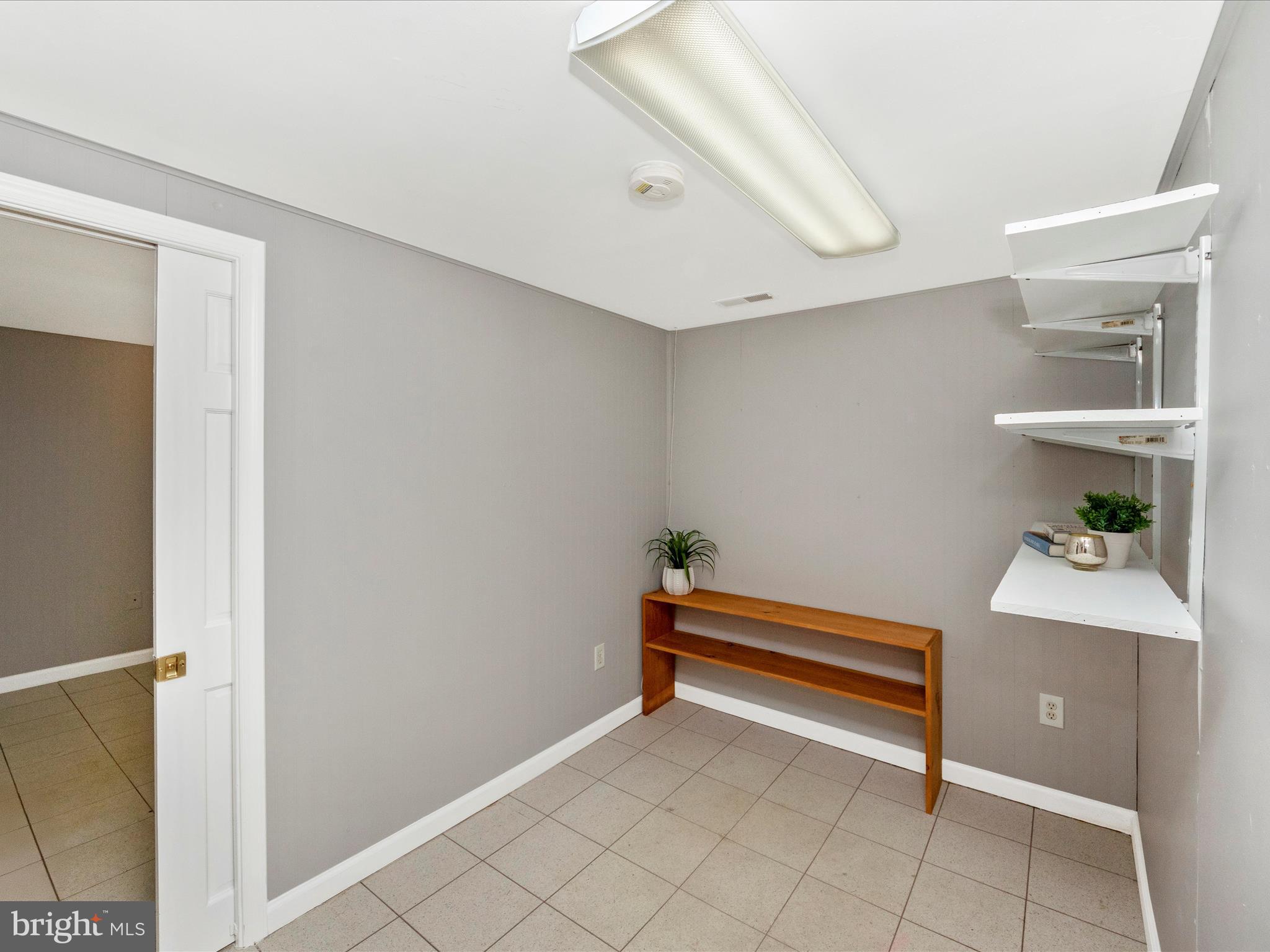 5610 Braxfield Road Halethorpe, MD 21227 - Photo 21 of 32 a view of room with furniture and a fan