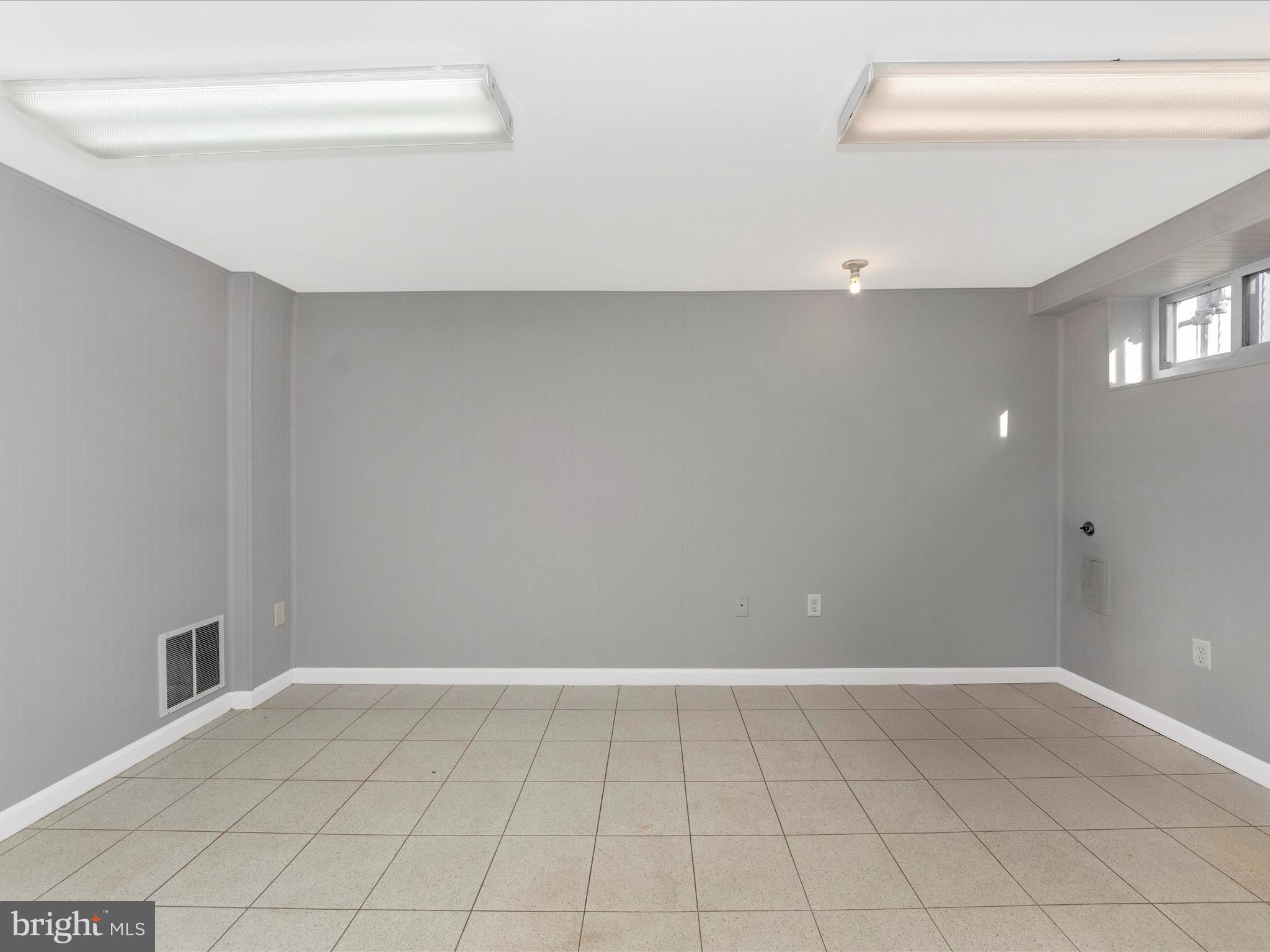 5610 Braxfield Road Halethorpe, MD 21227 - Photo 23 of 32 a view of an empty room