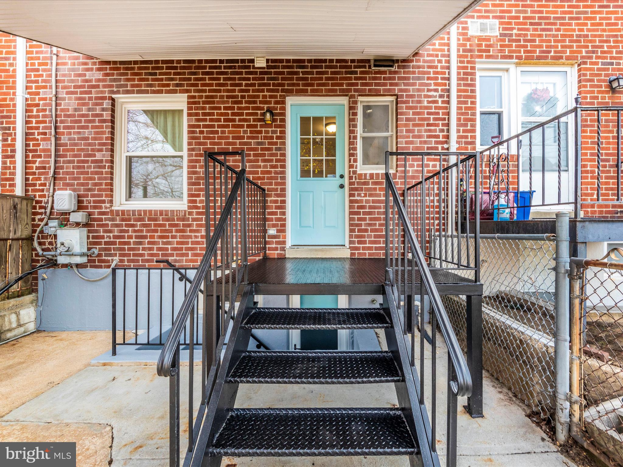 5610 Braxfield Road Halethorpe, MD 21227 - Photo 25 of 32 a view of staircase with wooden floor and windows