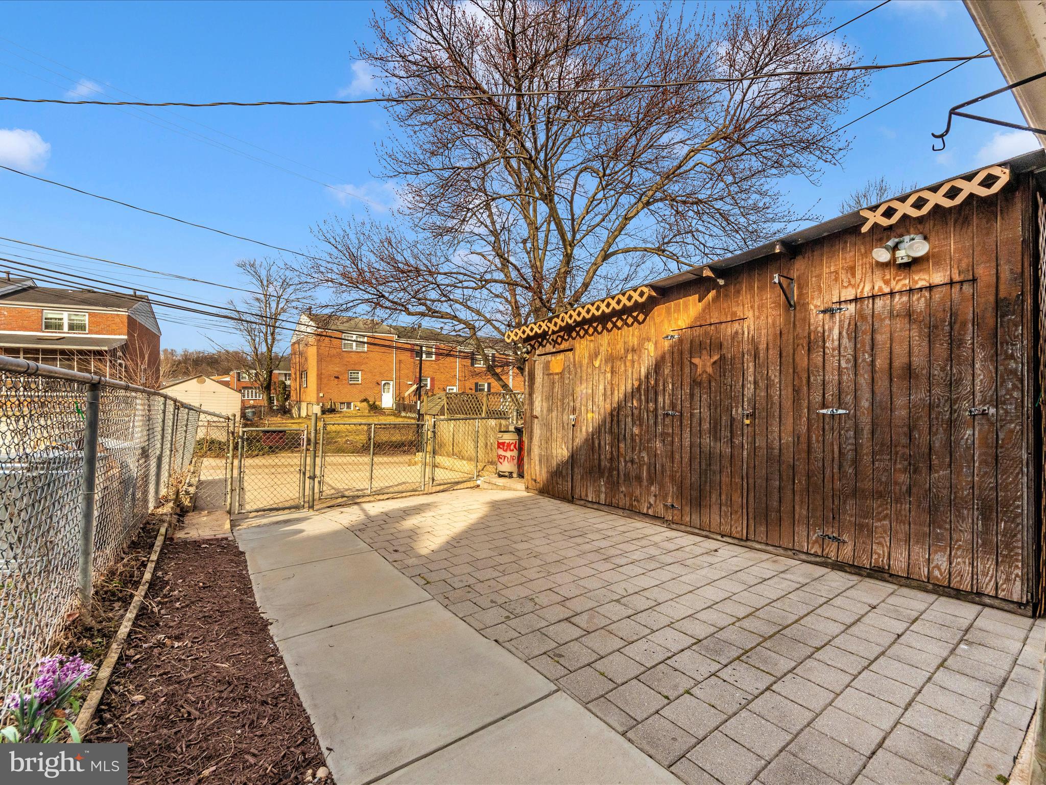 5610 Braxfield Road Halethorpe, MD 21227 - Photo 26 of 32 a view of backyard with a patio