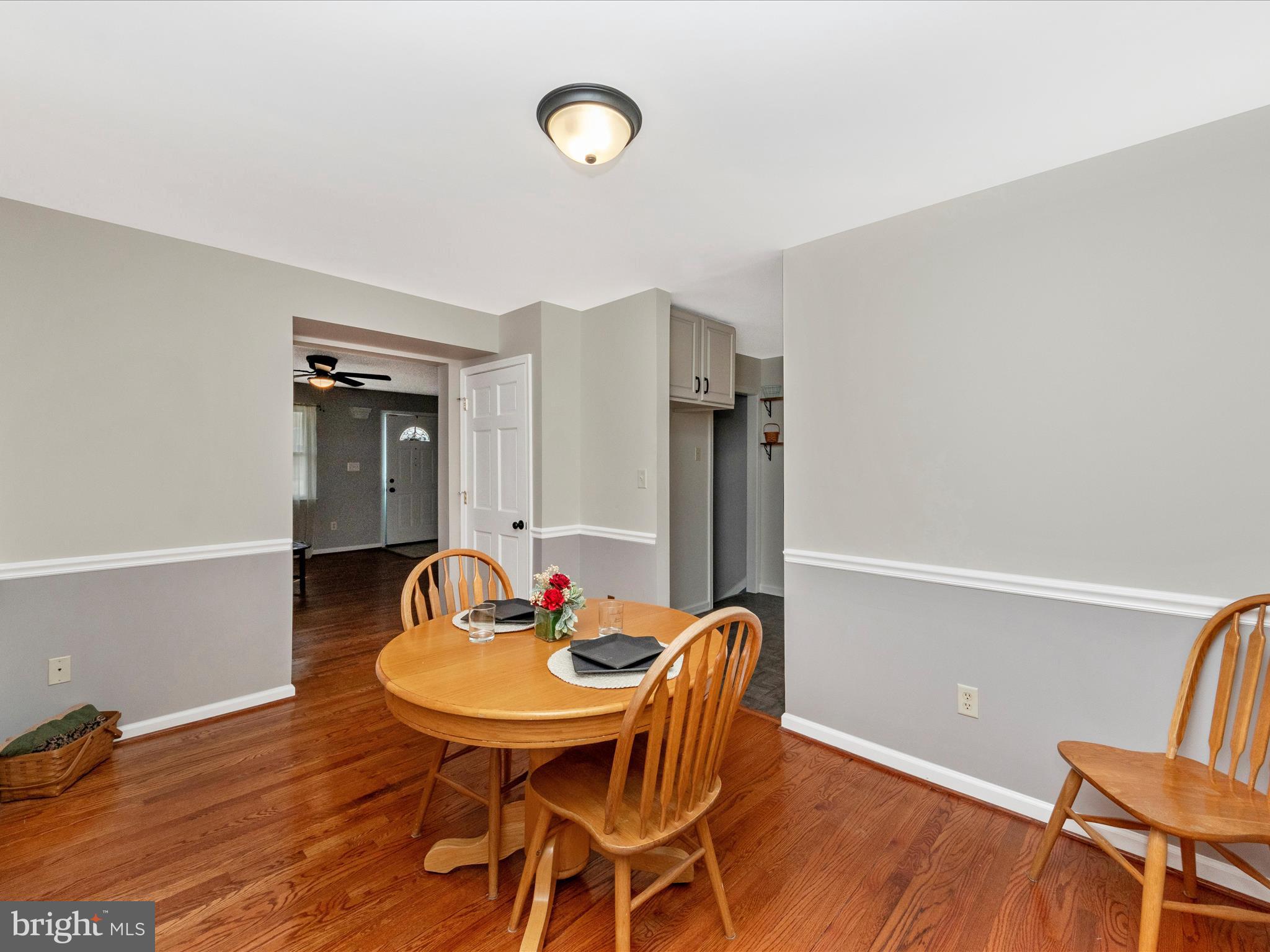 5610 Braxfield Road Halethorpe, MD 21227 - Photo 6 of 32 a view of a dining room with furniture and wooden floor