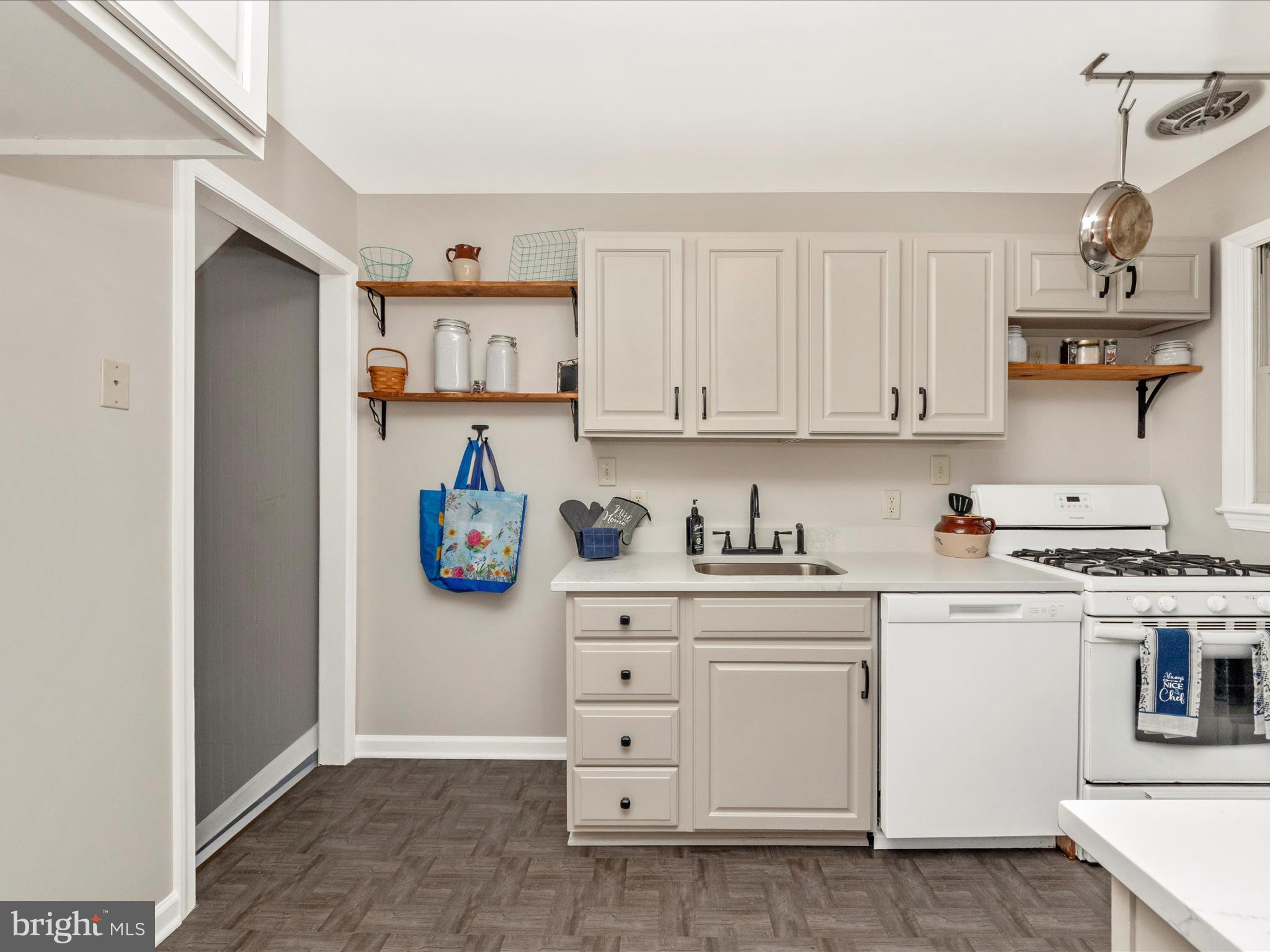 5610 Braxfield Road Halethorpe, MD 21227 - Photo 7 of 32 a view of kitchen with cabinets and stainless steel appliances