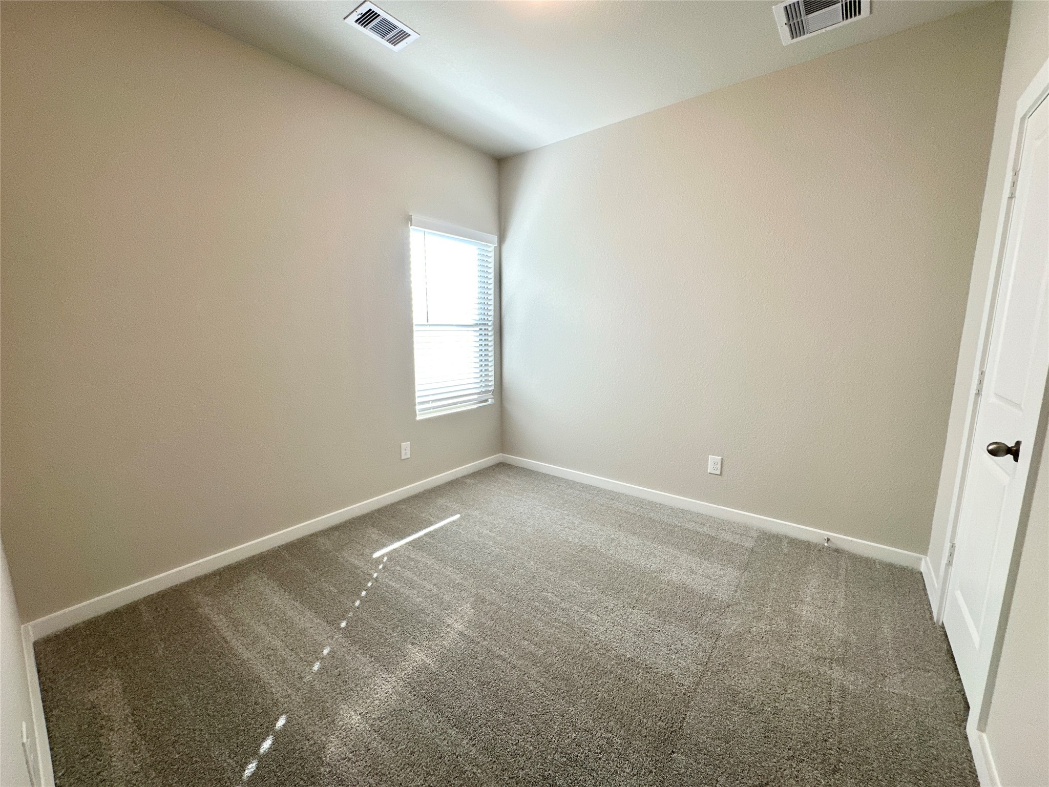 12194 Ridge Top Drive Conroe, TX 77304 - Photo 19 of 33 a view of an empty room and window