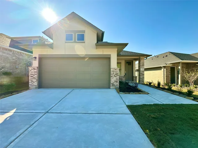 a view of a back yard of the house