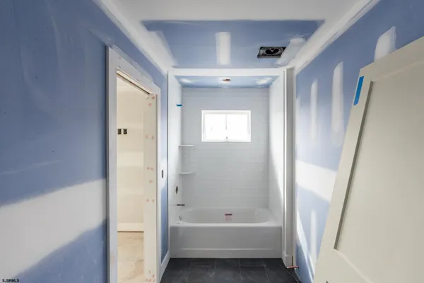 a bathroom with a bathtub