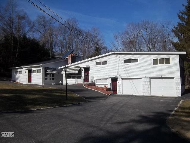 22 Pleasant Rise Brookfield, CT 06804 - Photo 1 of 1 a view of a house with backyard and garden
