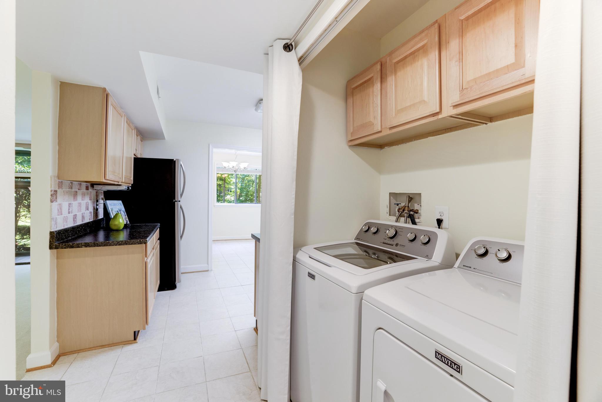 1631 Parkcrest Circle, Unit 8B/101 Reston, VA 20190 - Photo 14 of 27 Laundry closet with full size machines and storage