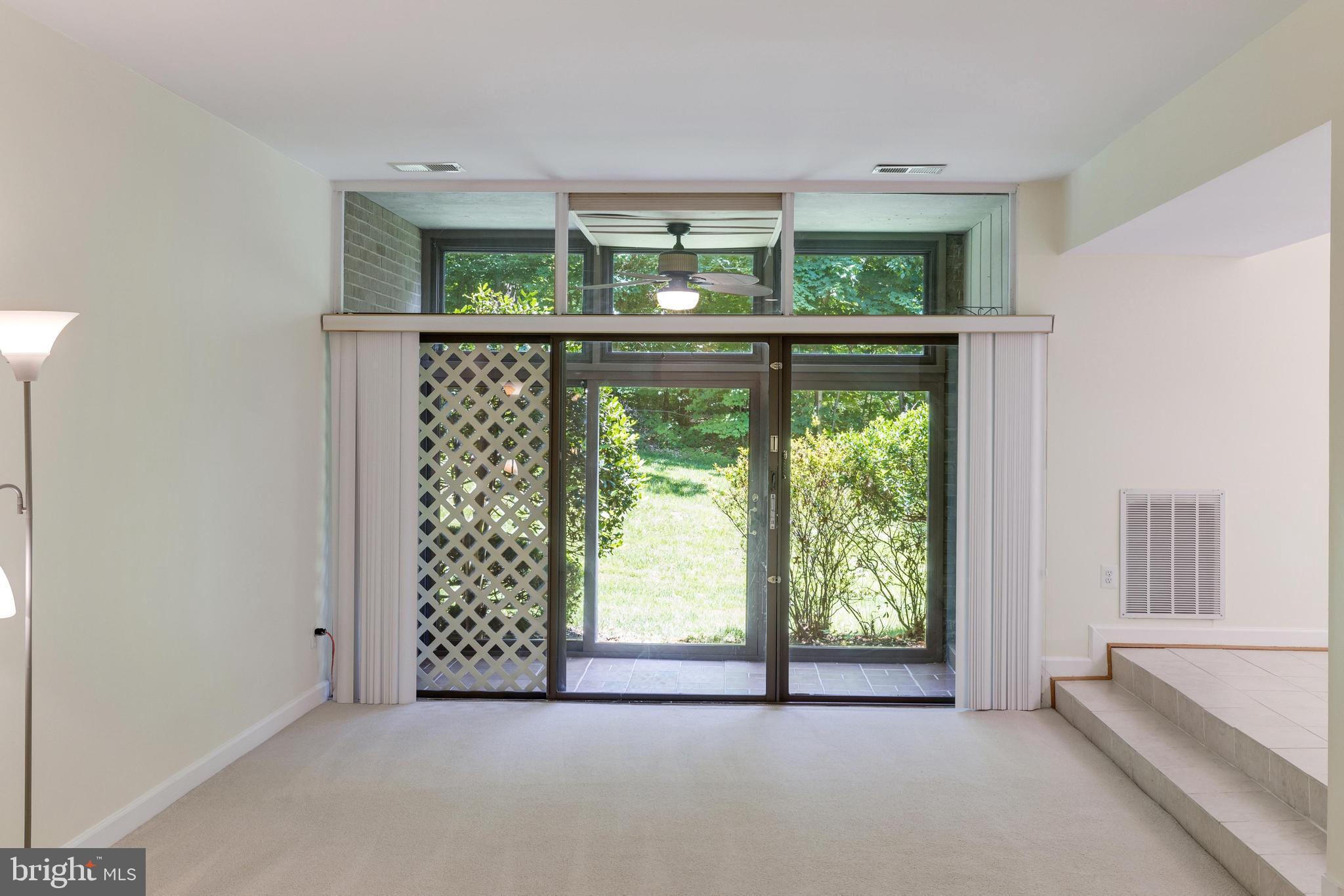 1631 Parkcrest Circle, Unit 8B/101 Reston, VA 20190 - Photo 23 of 27 Wall of glass invites you to enjoy amazing nature