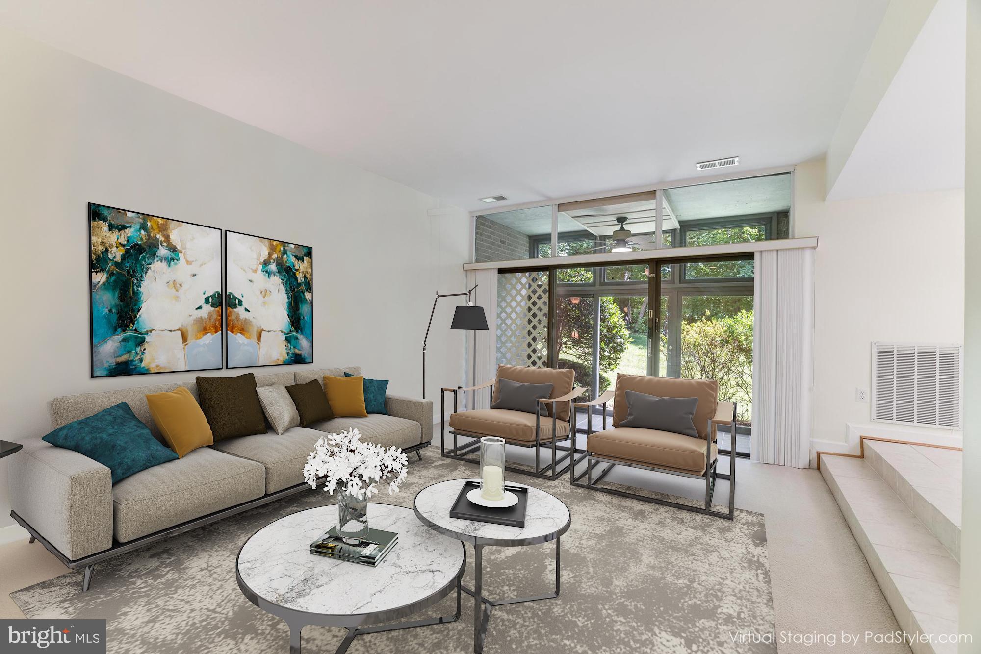 1631 Parkcrest Circle, Unit 8B/101 Reston, VA 20190 - Photo 4 of 27 Large beautiful living room is open to sunroom.