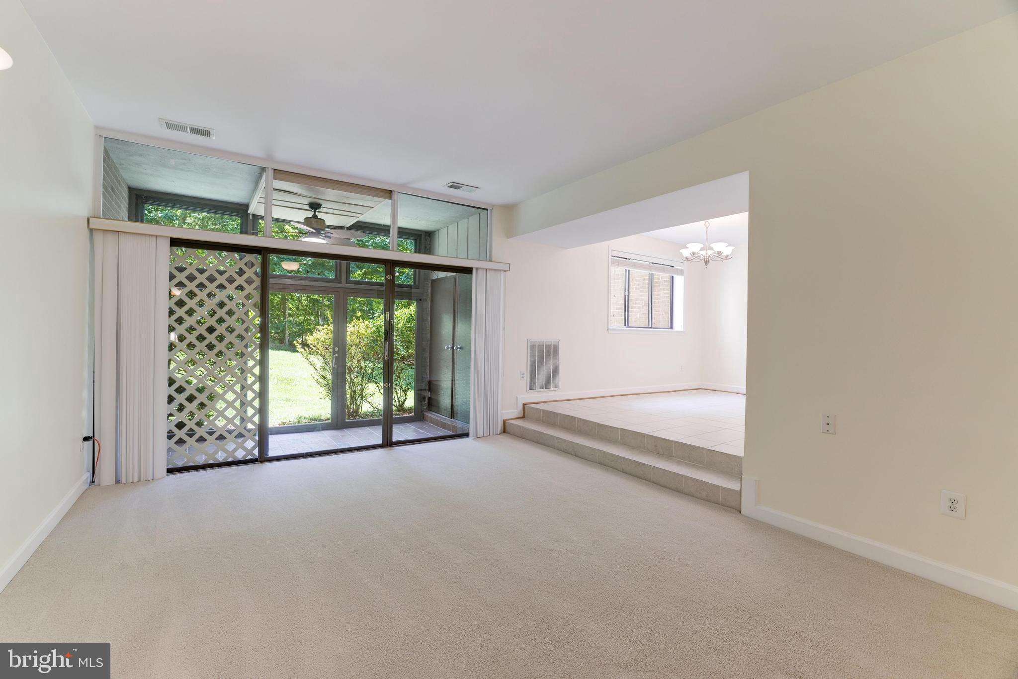 1631 Parkcrest Circle, Unit 8B/101 Reston, VA 20190 - Photo 5 of 27 Living room with loads of light.