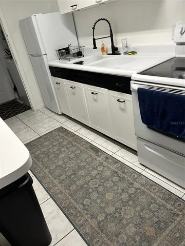 a bedroom with a bed and a walk in closet