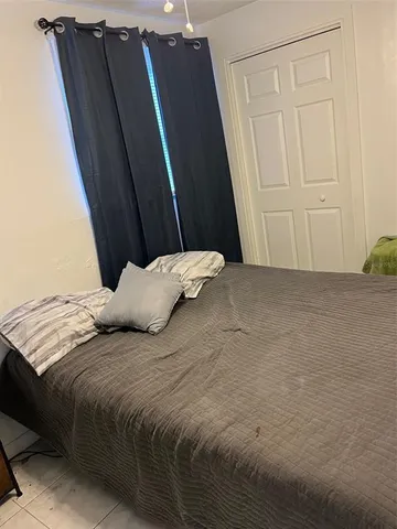 a room with furniture and rug