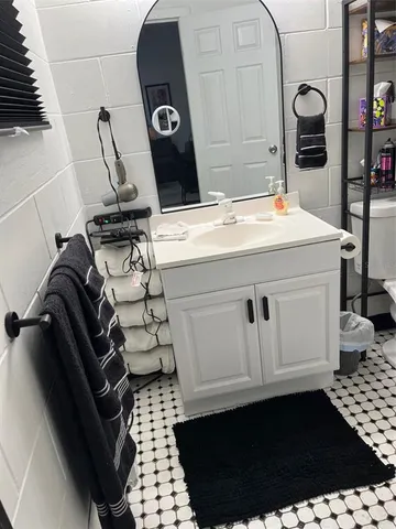 a bathroom with a sink and a bathtub