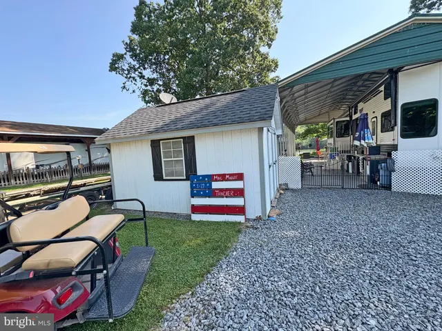 a backyard of a house with seating space