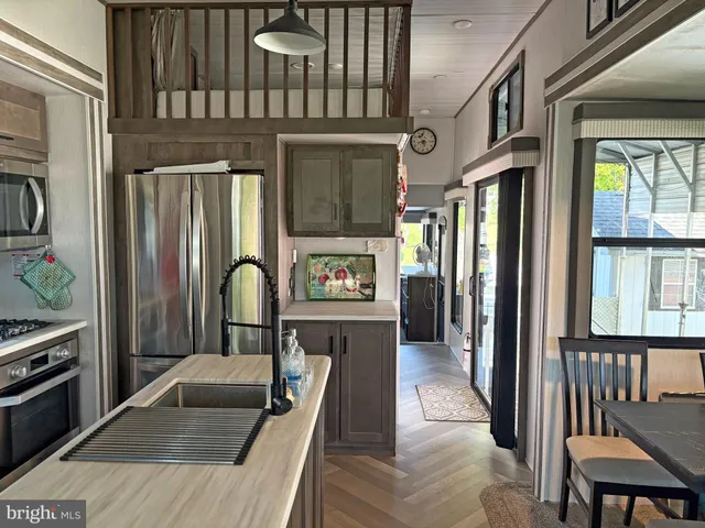 a view of a living room filled with furniture