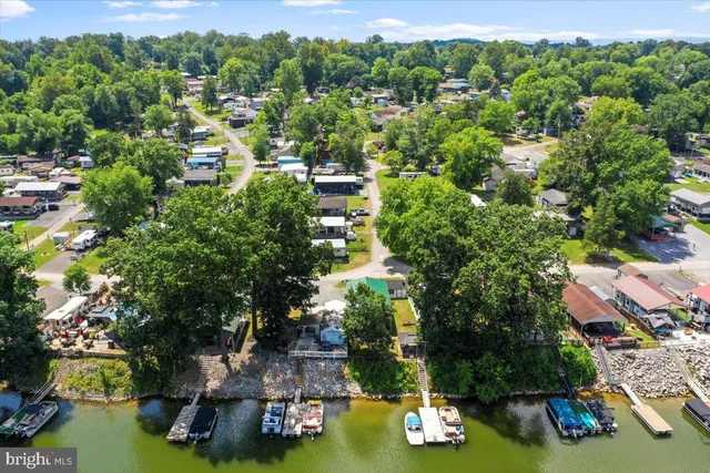 an aerial view of a garden with houses