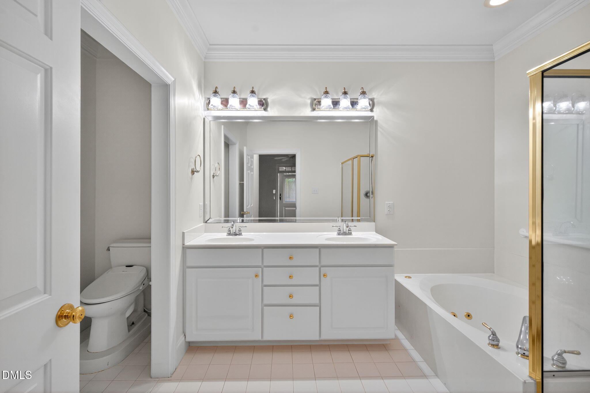 3421 Barron Berkeley Way Raleigh, NC 27612 - Photo 27 of 48 a spacious bathroom with a tub sink and mirror