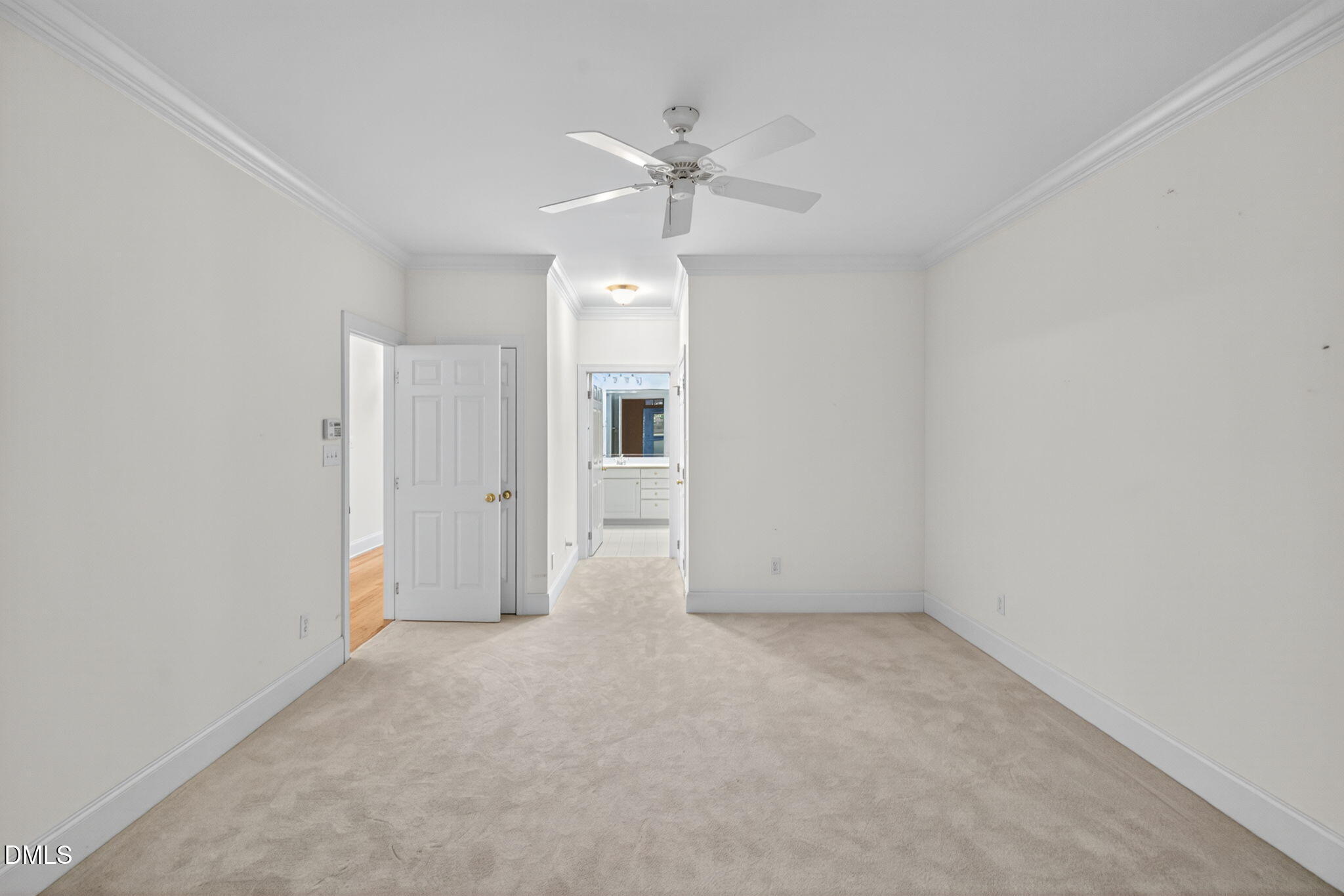 3421 Barron Berkeley Way Raleigh, NC 27612 - Photo 37 of 48 a view of an empty room with a ceiling fan