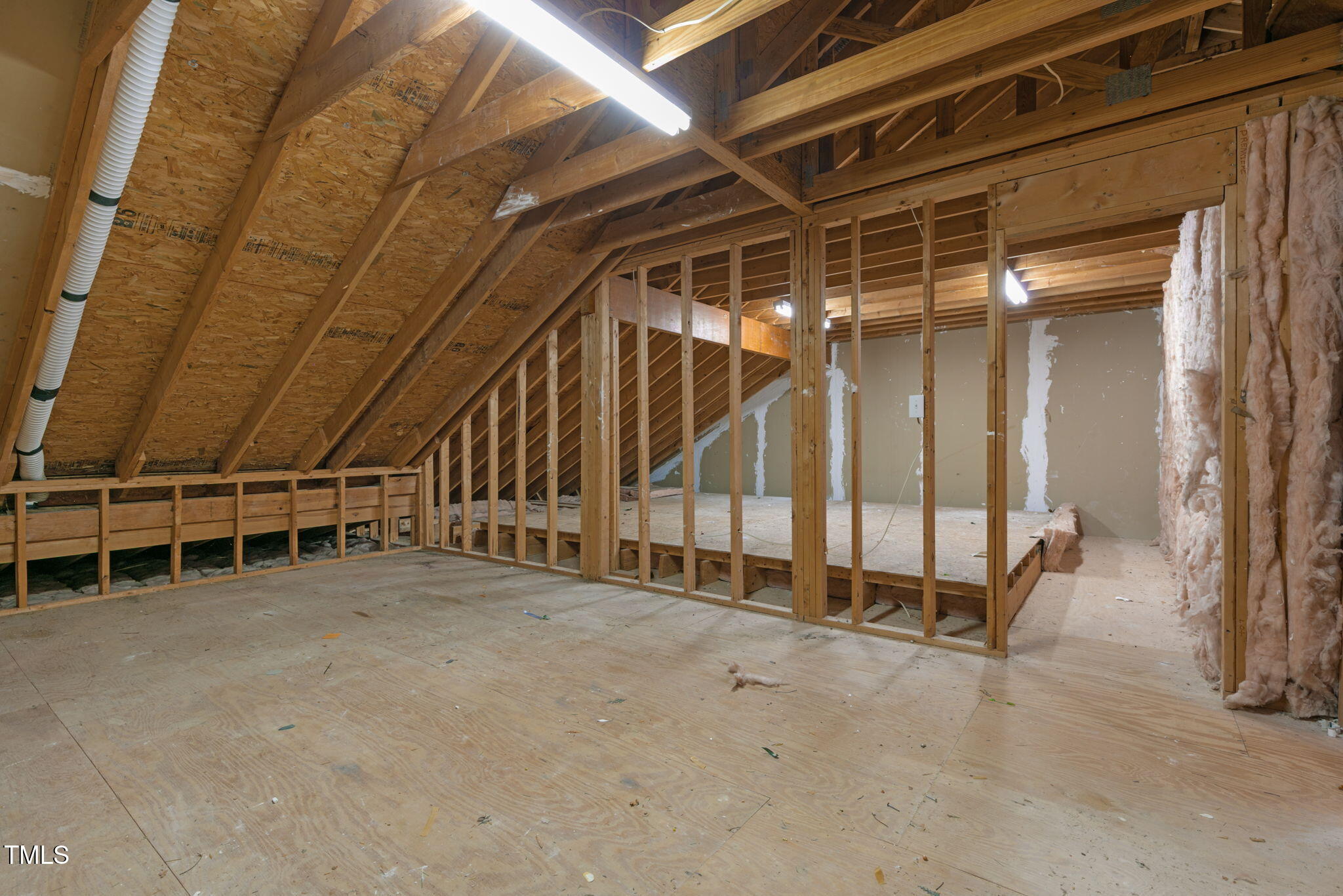 3421 Barron Berkeley Way Raleigh, NC 27612 - Photo 38 of 48 a view of an empty room with wooden walls