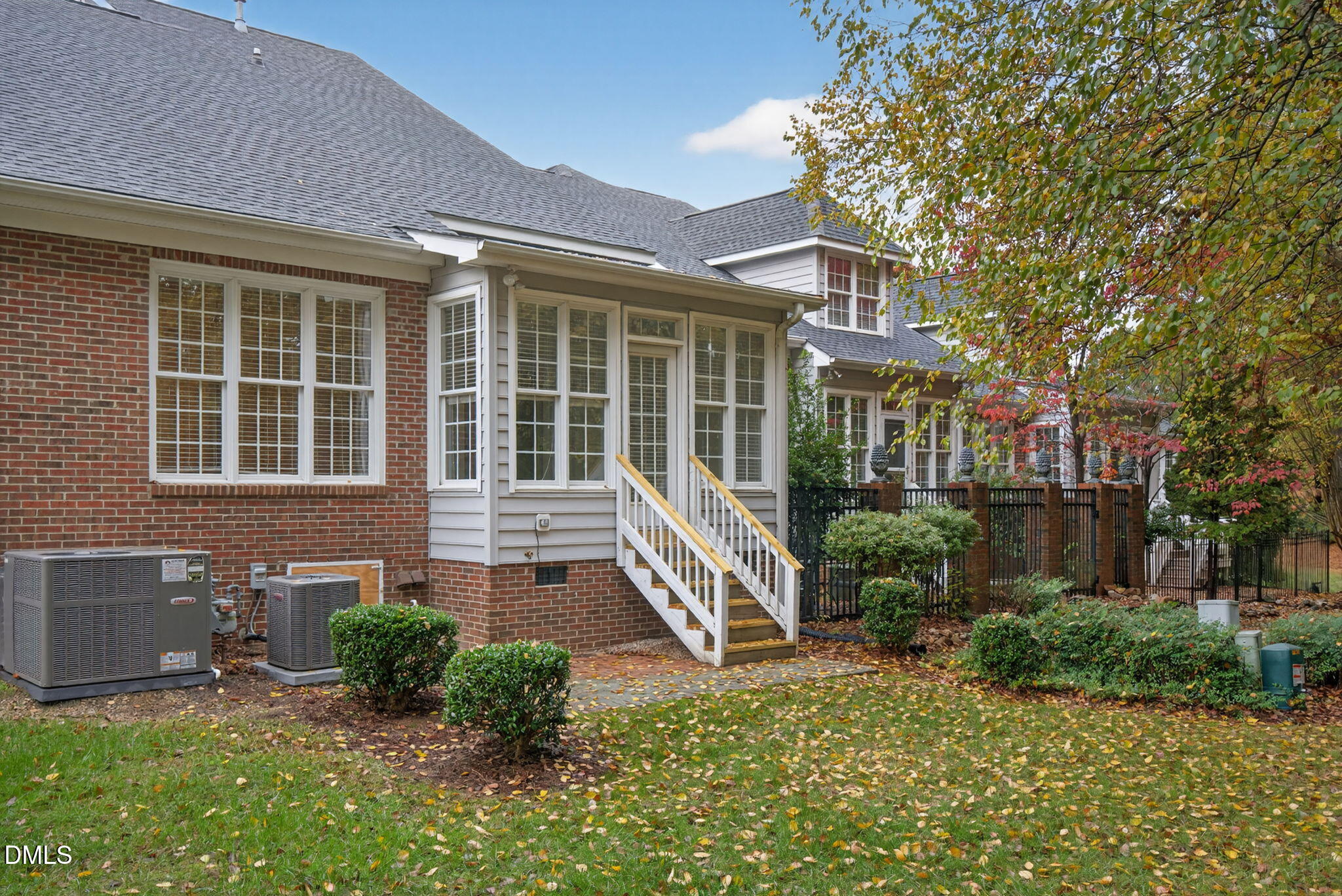 3421 Barron Berkeley Way Raleigh, NC 27612 - Photo 43 of 48 a front view of a house with a yard