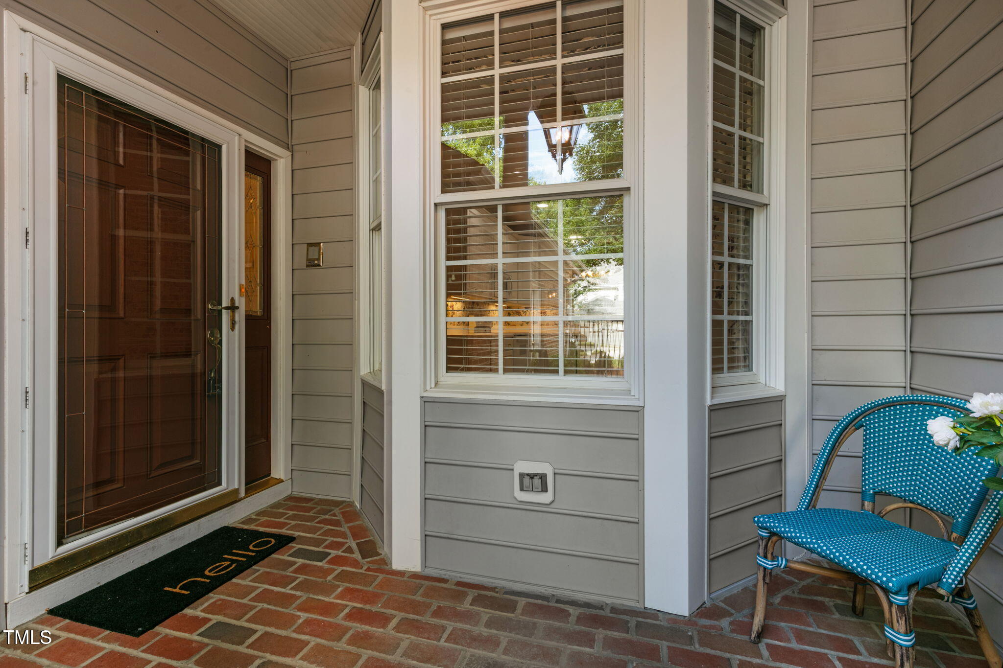 3421 Barron Berkeley Way Raleigh, NC 27612 - Photo 6 of 48 a view of a door and chair in front of door