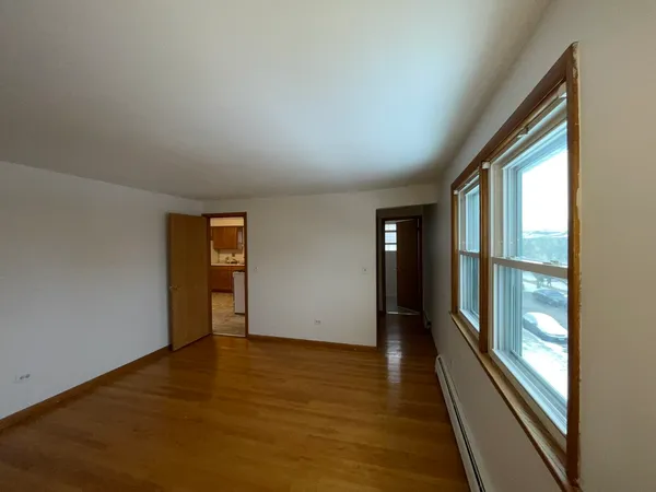 a view of an empty room and window