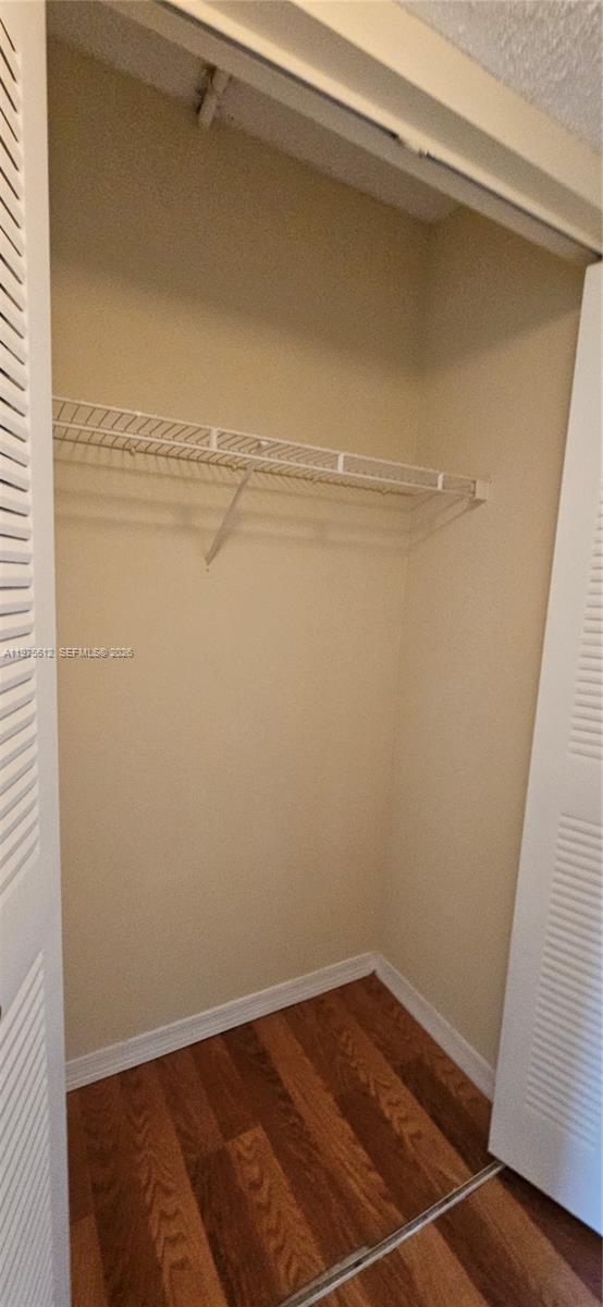 3848 Lyons Road, Unit 2051 Coconut Creek, FL 33073 - Photo 13 of 36 First Closet in 2nd Bedroom