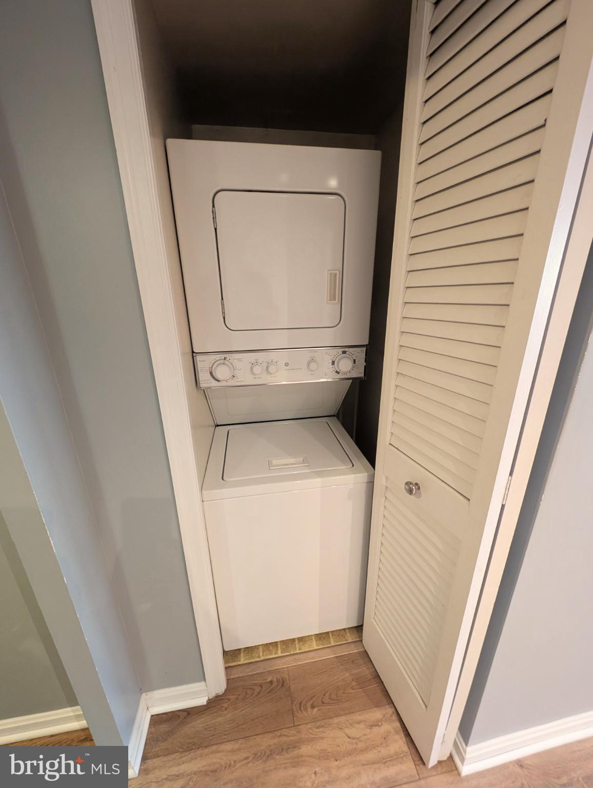 1301 North Courthouse Road, Unit 1202 Arlington, VA 22201 - Photo 4 of 17 a utility room with dryer and washer