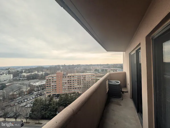 a view of balcony with furniture