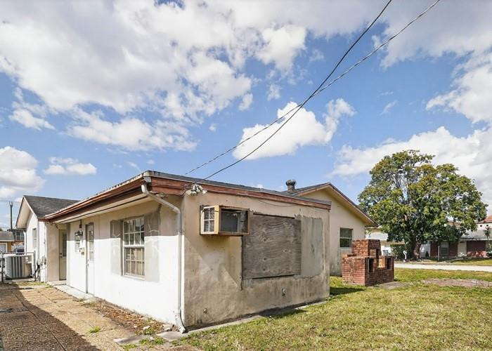 22164 Southwest 65th Terrace Boca Raton, FL 33428 - Photo 4 of 20 a front view of a house with a yard