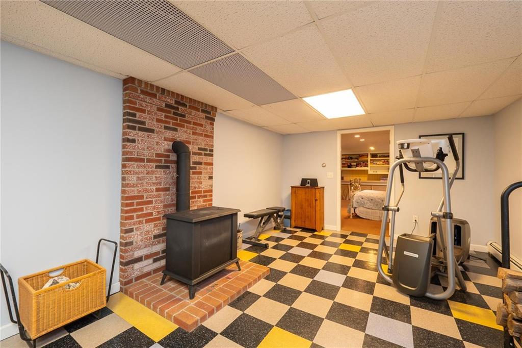 41 Eldridge Road York, ME 03909 - Photo 27 of 35 A woodstove provides coziness on...