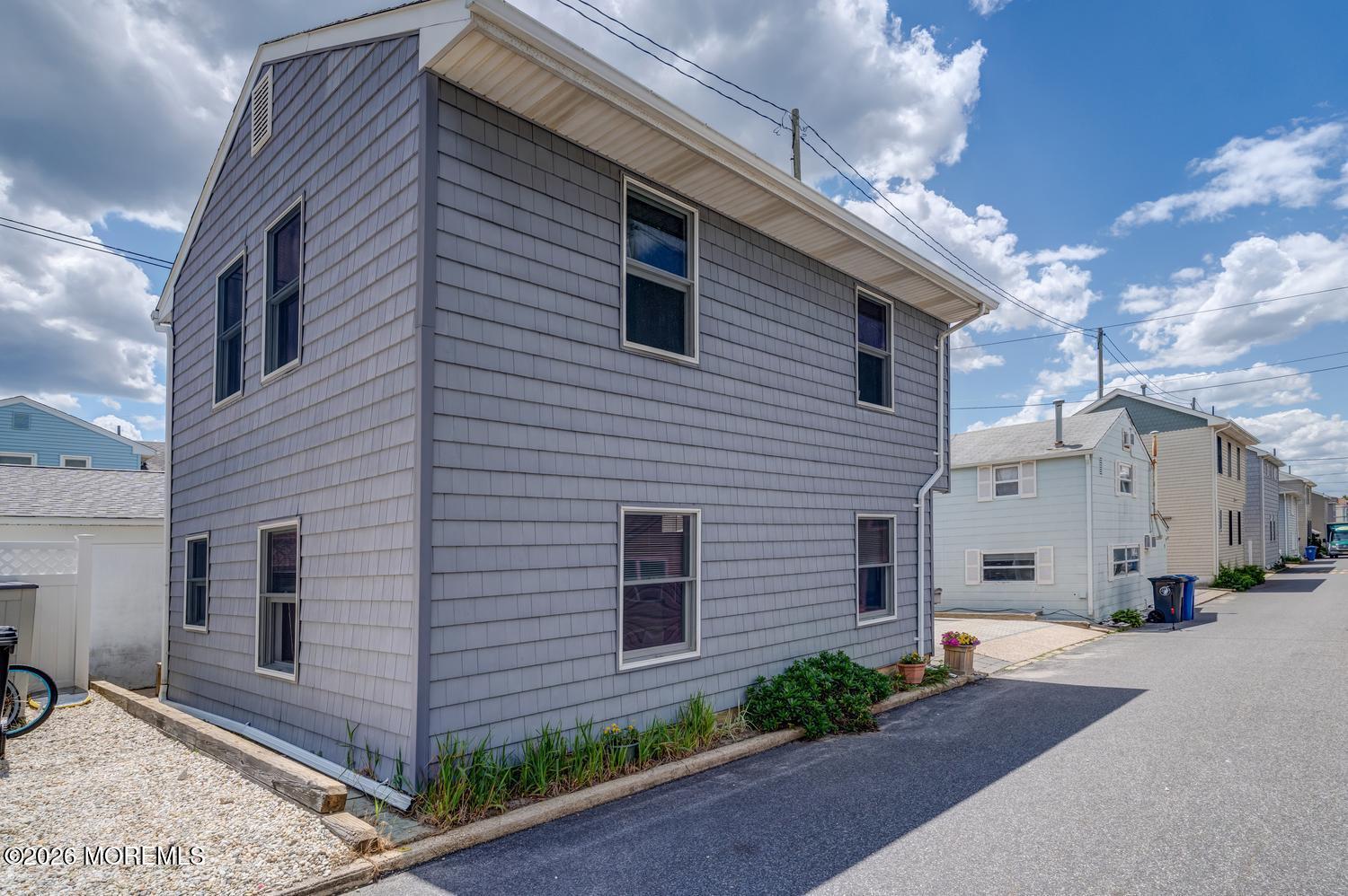 19 Shore Way Lavallette, NJ 08735 - Photo 23 of 38 a view of a white building among the street