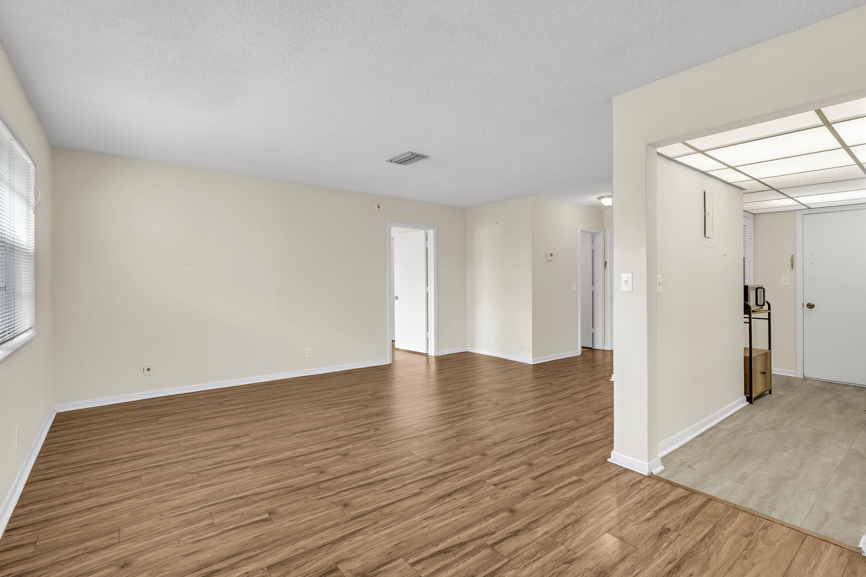 298 Southwest 6th Street, Unit 204 Boca Raton, FL 33432 - Photo 11 of 22 a view of empty room with wooden floor