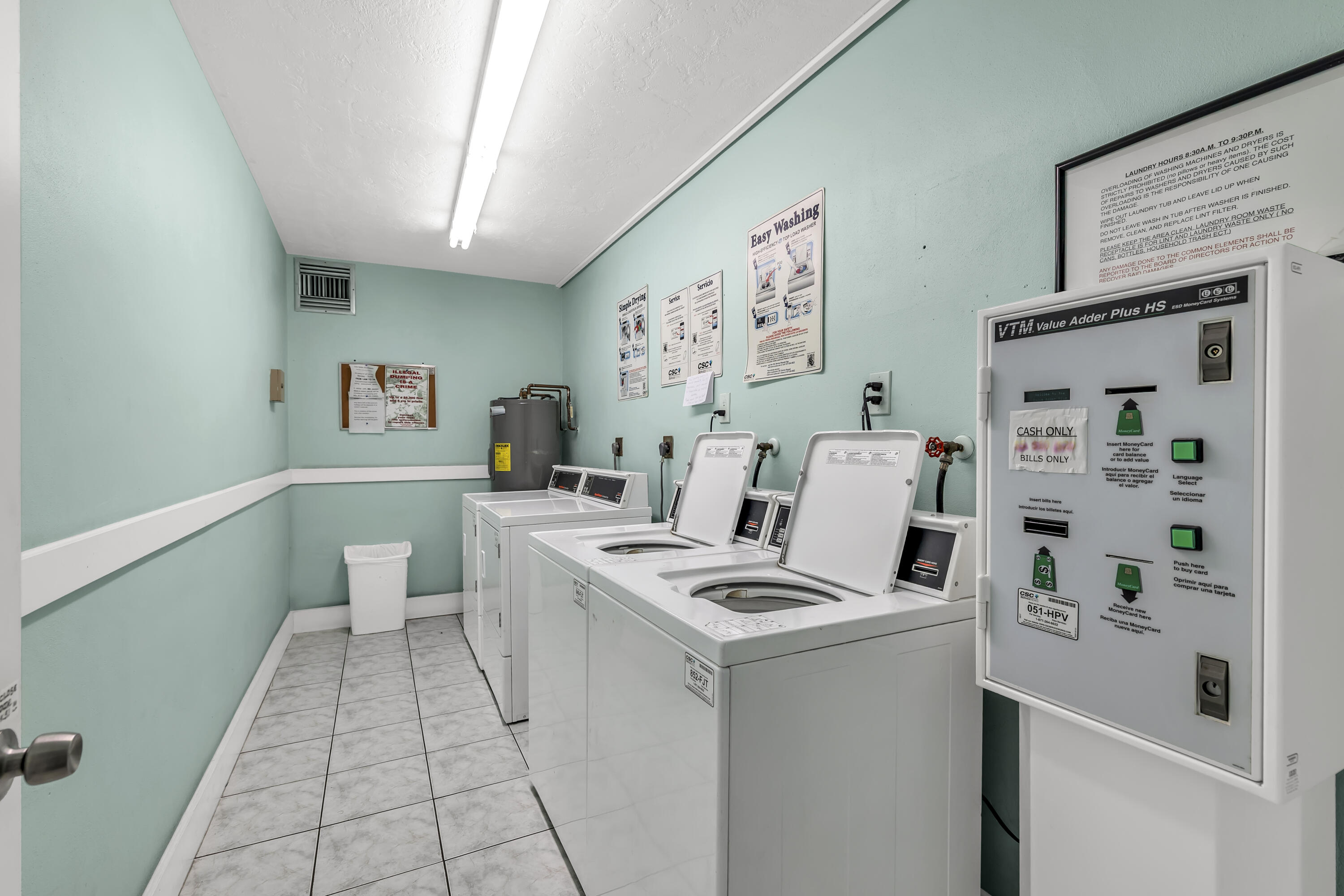 298 Southwest 6th Street, Unit 204 Boca Raton, FL 33432 - Photo 22 of 22 a living room with furniture and white walls