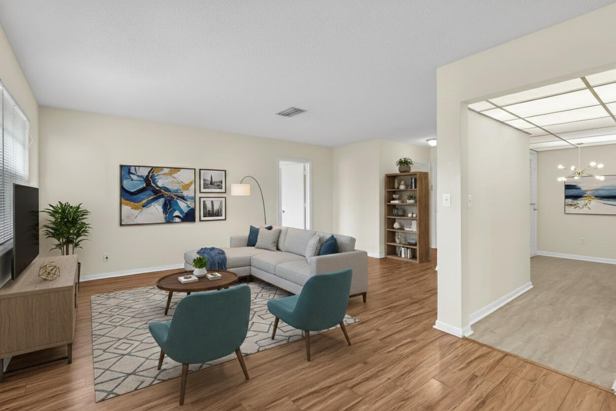 298 Southwest 6th Street, Unit 204 Boca Raton, FL 33432 - Photo 6 of 22 a living room with furniture and a wooden floor