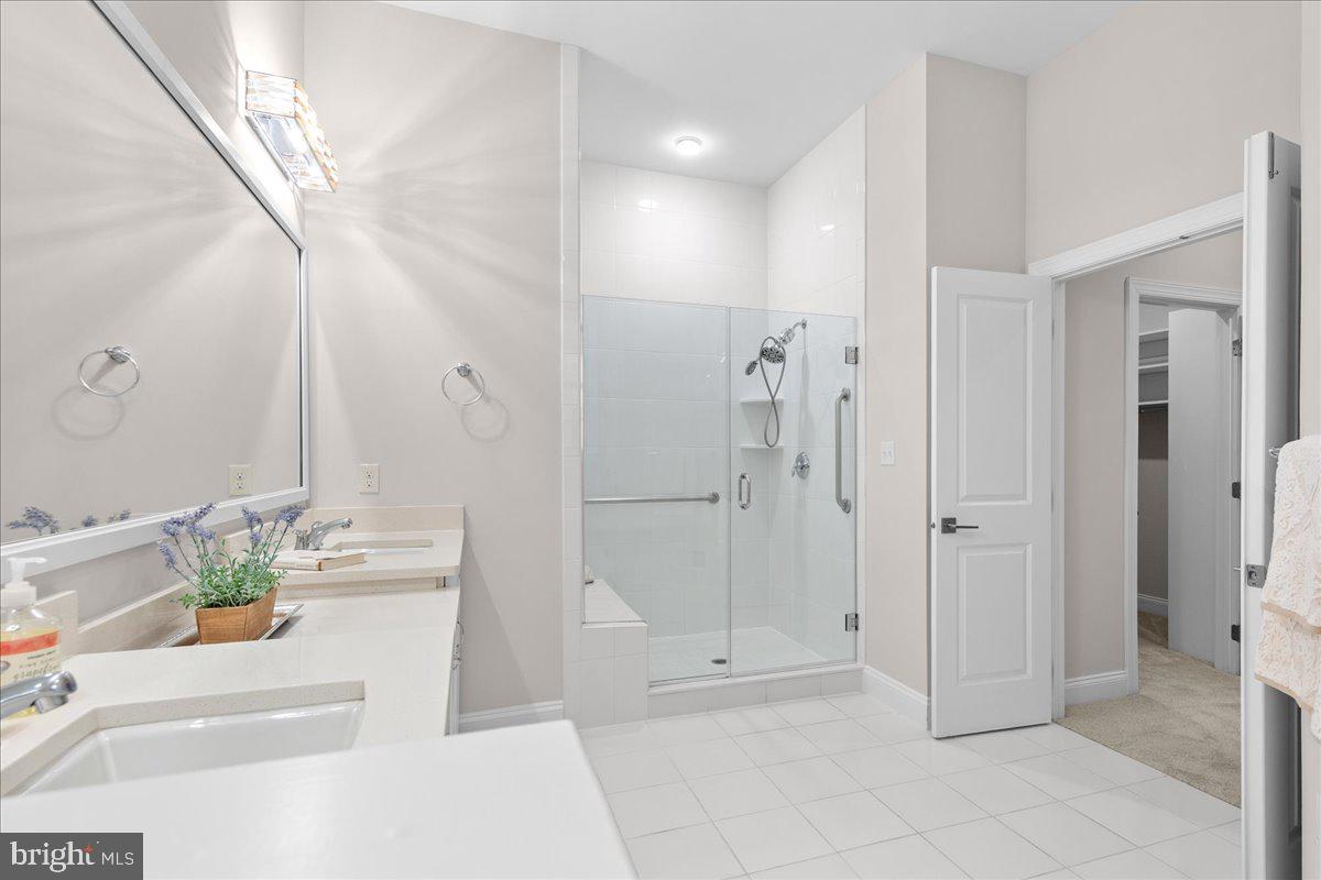 13712 Long Ridge Drive Gainesville, VA 20155 - Photo 22 of 62 a bathroom with a shower and a sink