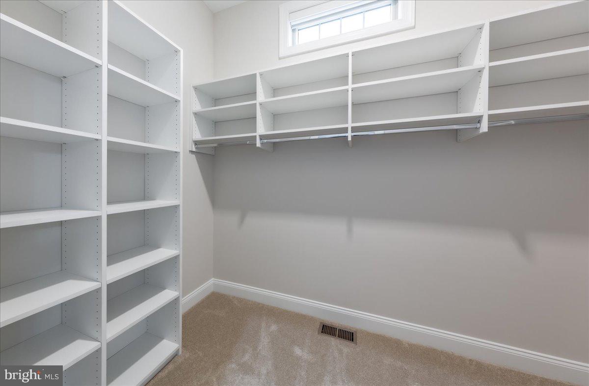 13712 Long Ridge Drive Gainesville, VA 20155 - Photo 25 of 62 a view of an empty walk in closet