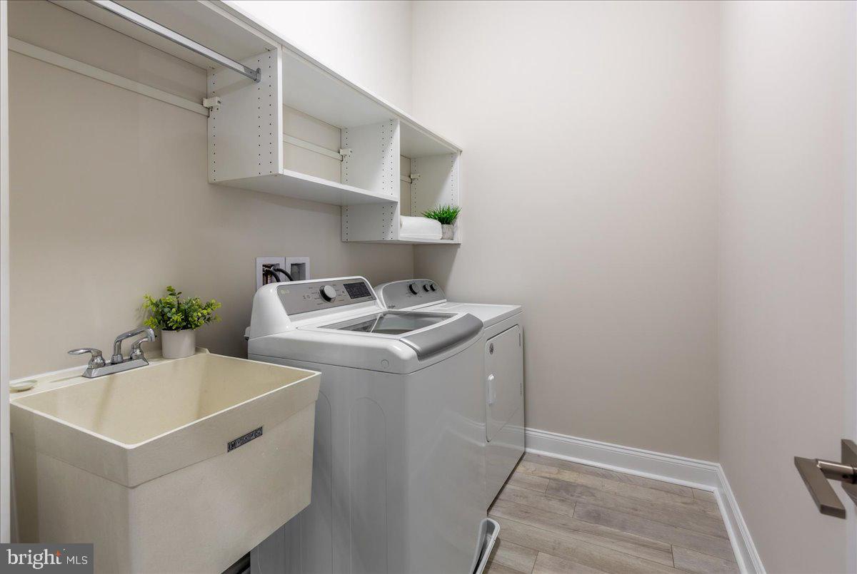 13712 Long Ridge Drive Gainesville, VA 20155 - Photo 32 of 62 a utility room with sink dryer and washer