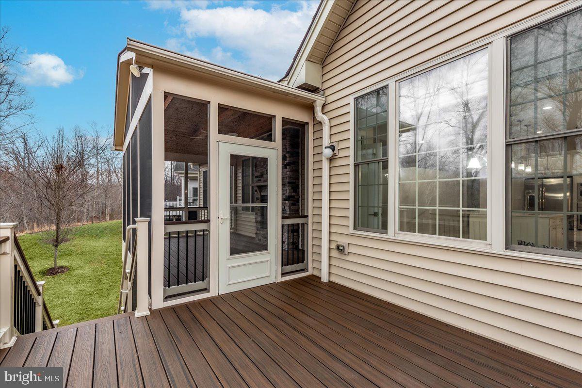 13712 Long Ridge Drive Gainesville, VA 20155 - Photo 38 of 62 a view of a house with a deck