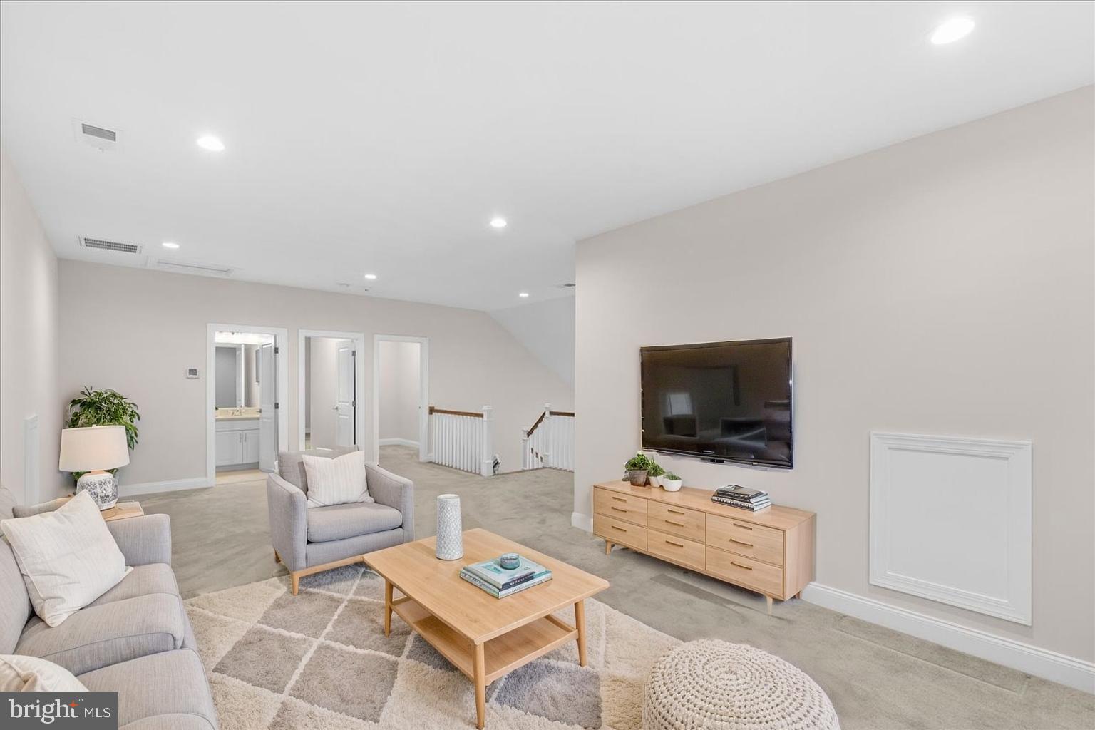 13712 Long Ridge Drive Gainesville, VA 20155 - Photo 39 of 62 a living room with furniture and a flat screen tv