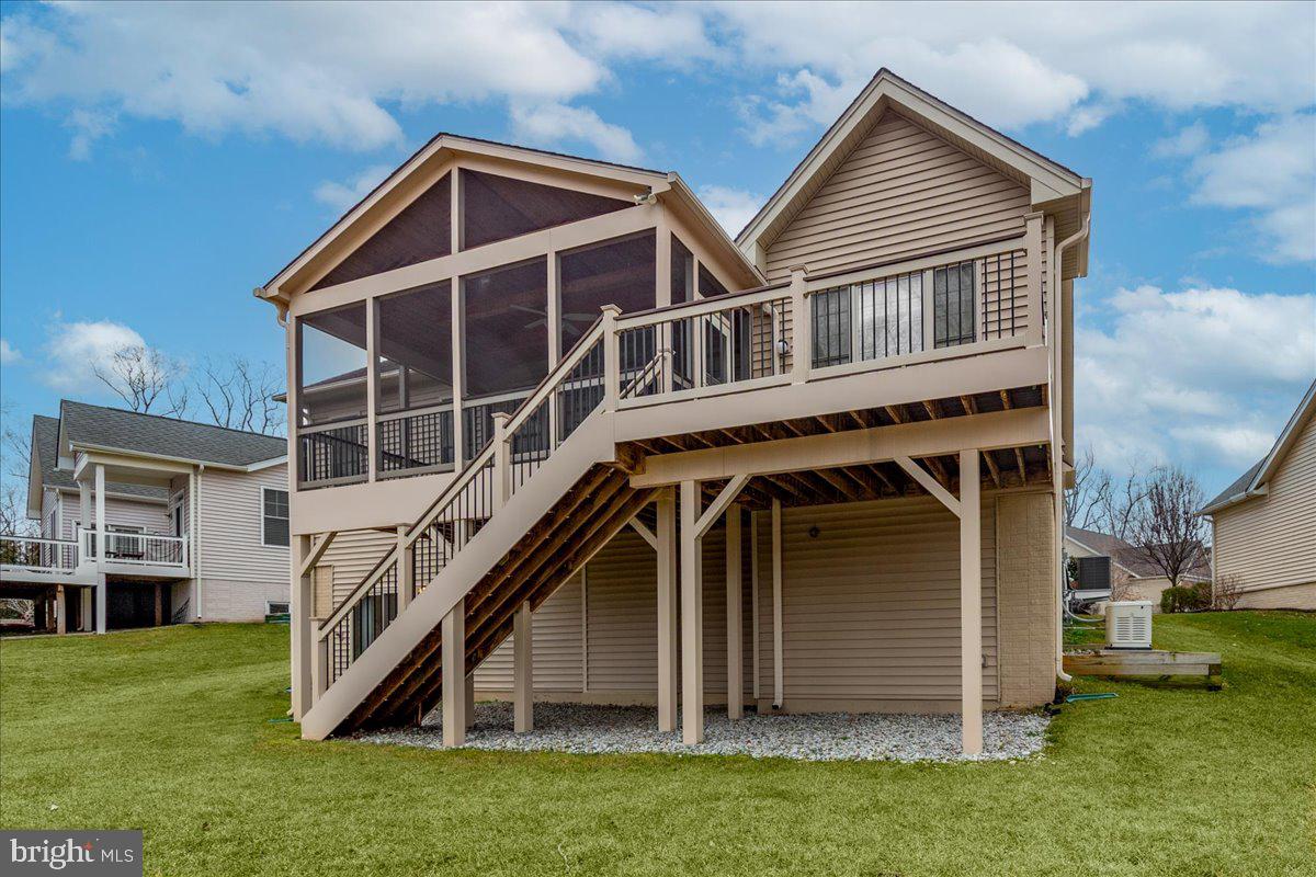 13712 Long Ridge Drive Gainesville, VA 20155 - Photo 48 of 62 a view of a house with a yard